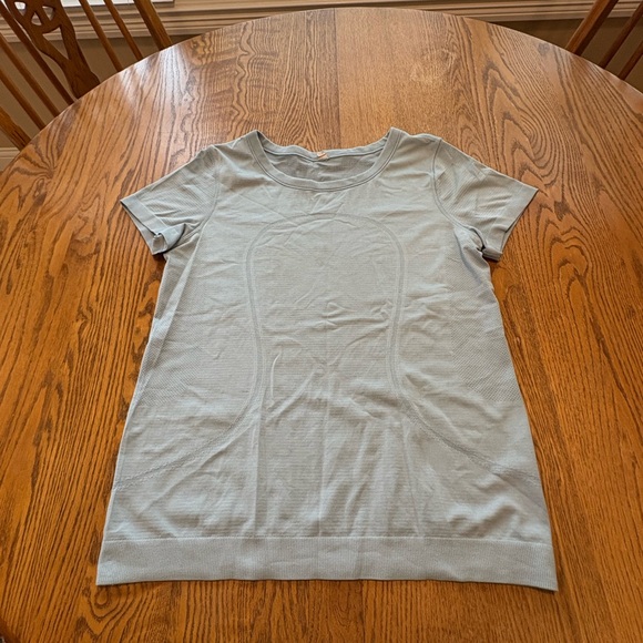 lululemon athletica Tops - Lululemon Light Blue Swiftly Tech Tee 8 Discoloration Read
